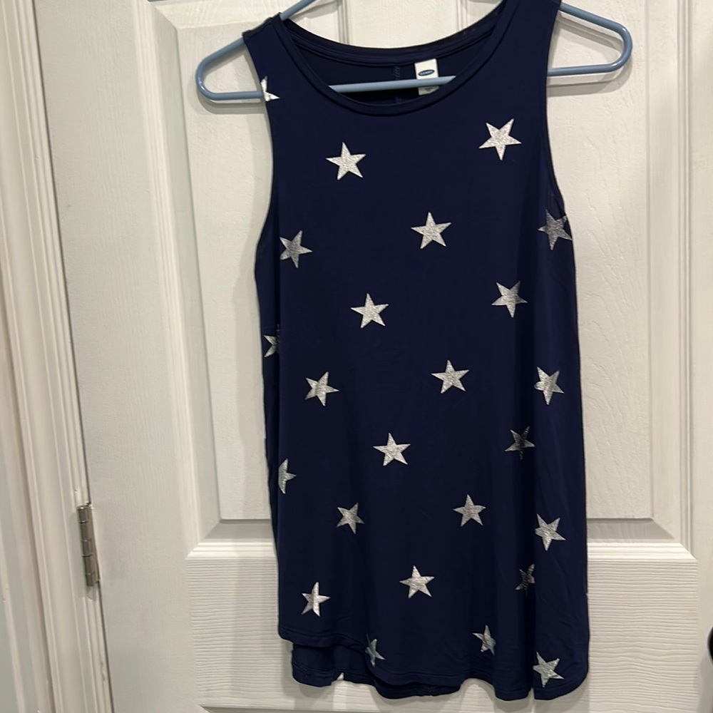 Woman’s Old Navy top. Size XS. Navy blue with stars.  Never worn no flaws.